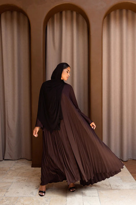 Abayas and Cloths: Weaving Stories of Style and Culture